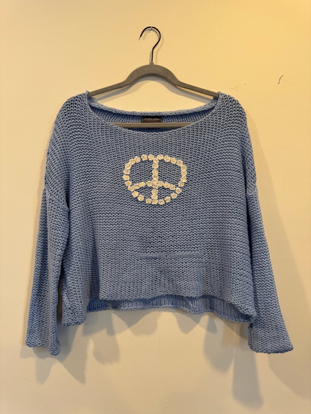 Wooden Ships Light Blue Cropped Knit Sweater with White Daisy Peace Motif